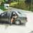25.04.2000:Auto on j��hdyttely paussilla ja Nat poseeraa.